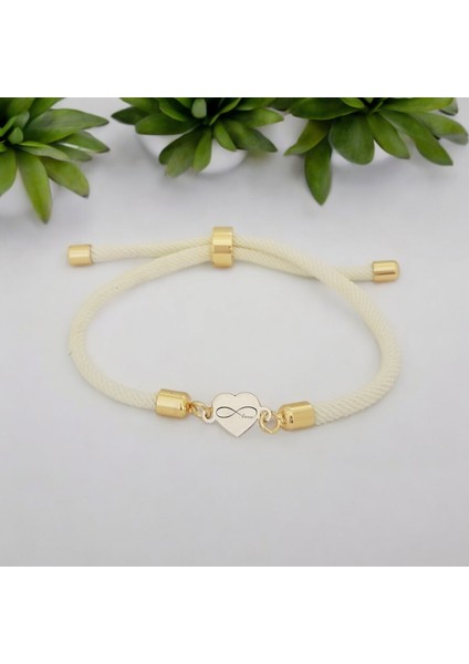 14 Ayar Altın Plakalı Sonsuz Aşk Temalı Beyaz Örgülü Kalp Figürlü Hediye BILEKLIK-478SEMBOL fiyatları