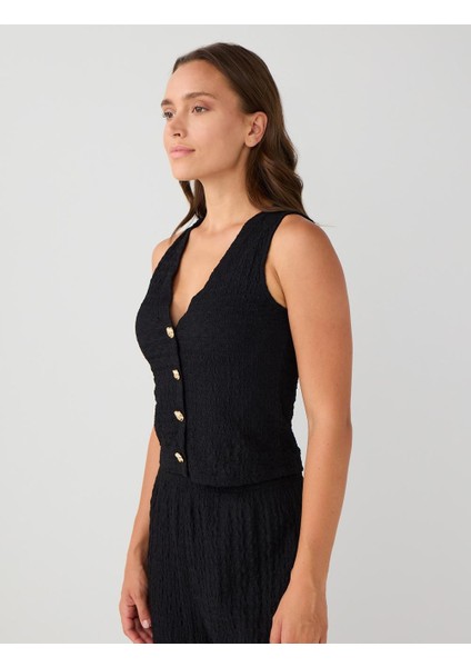 Siyah Dar Kesim Parlak Düğme Detaylı Örme Yelek modelleri
