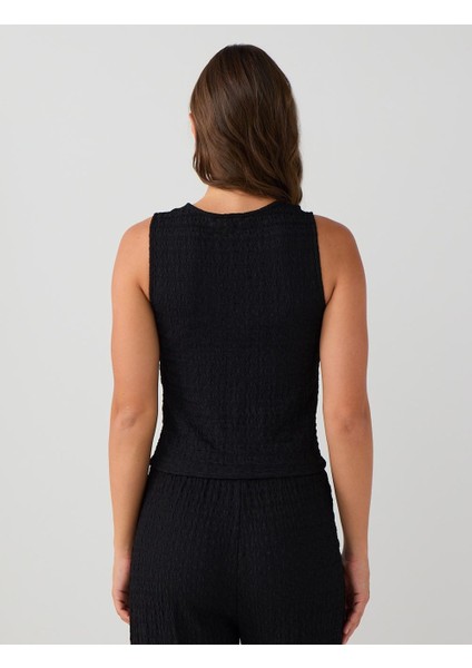 Siyah Dar Kesim Parlak Düğme Detaylı Örme Yelek indirimleri