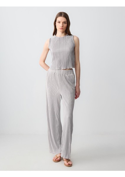 Gümüş Dar Kesim Yuvarlak Yaka Piliseli Örme Bluz fiyatları