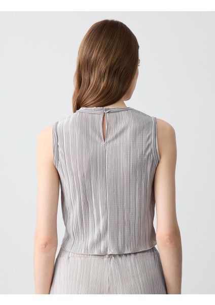 Gümüş Dar Kesim Yuvarlak Yaka Piliseli Örme Bluz indirimleri