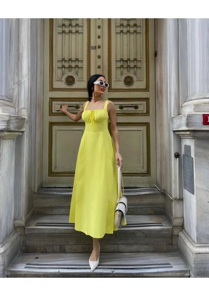 Premium Sarı Midi Boy Bağcıklı Pamuklu Çan Elbise fiyatları