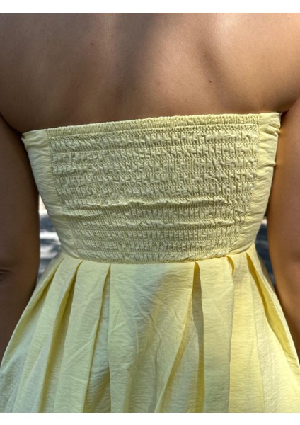 Kadın Sarı Straplez Pile Detaylı Gizli Fermuarlı Uzun Elbise fiyatları