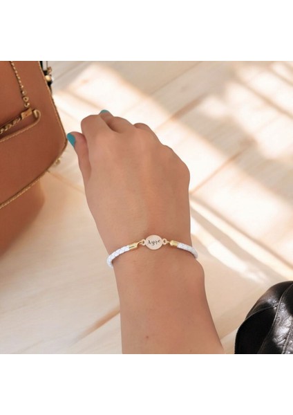 Ayşe İsmine Özel Oval Motifli 14 Ayar Altın Plakalı Doğal Beyaz Derili Hediye