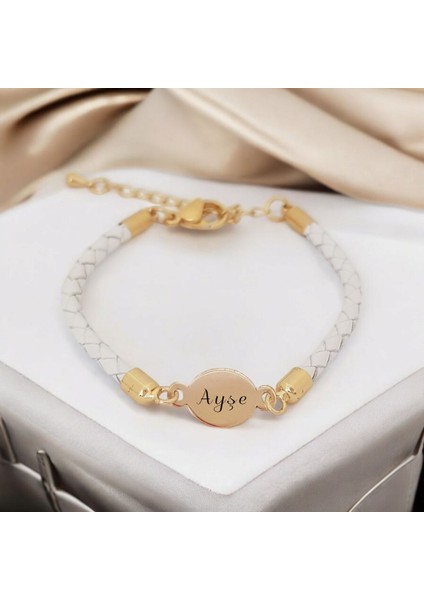 Ayşe İsmine Özel Oval Motifli 14 Ayar Altın Plakalı Doğal Beyaz Derili Hediye fiyatları