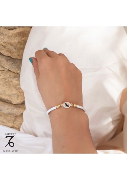 Oğlak Burçlarına Özel Doğal Beyaz Derili Oval Motifli 14 Ayar Altın Plakalı Hediye