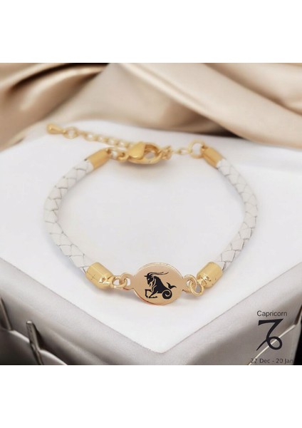 Oğlak Burçlarına Özel Doğal Beyaz Derili Oval Motifli 14 Ayar Altın Plakalı Hediye fiyatları