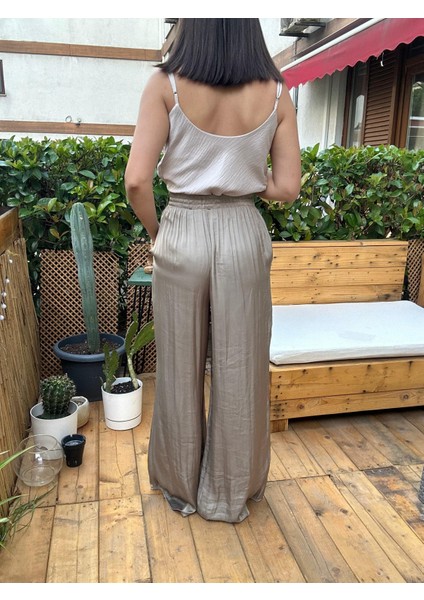 Beli Lastikli Bol Paça Saten Pantolon indirimleri