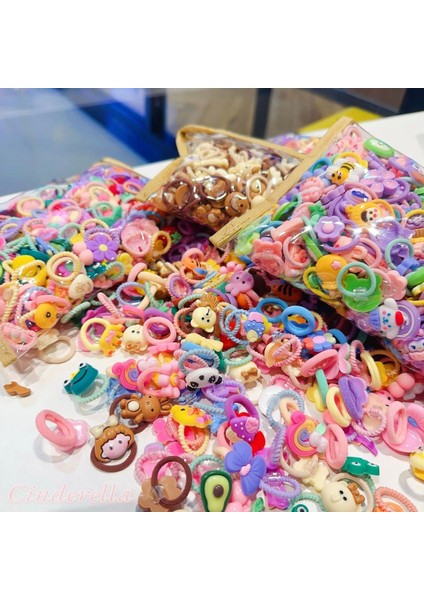 60'lı Renkli Karışık Figürlü Dayanıklı Kız Çocuk Lastik Toka Seti - Sevimli Bebek Lastikli Toka fırsatları