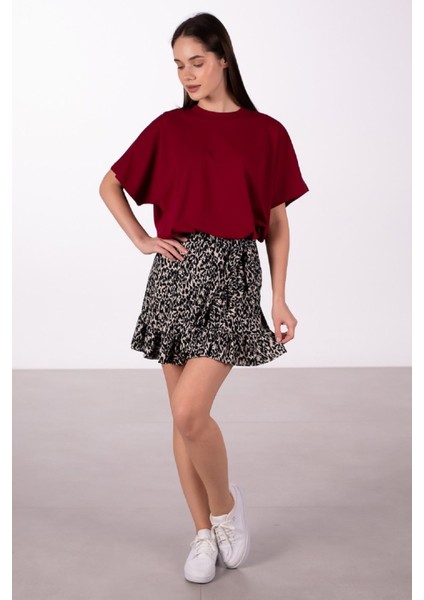 Beli Lastikli ve Bağlama Detaylı Leopar Desenli Yandan Fırfırlı Likralı Bürümcük Mini Etek