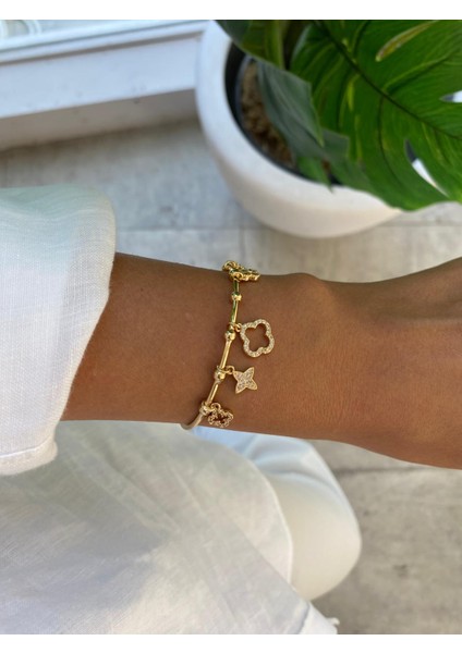 Yonca ve Çiçek Figürlü Zirkon Taşlı Ayarlamalı Açık Gold Bileklik