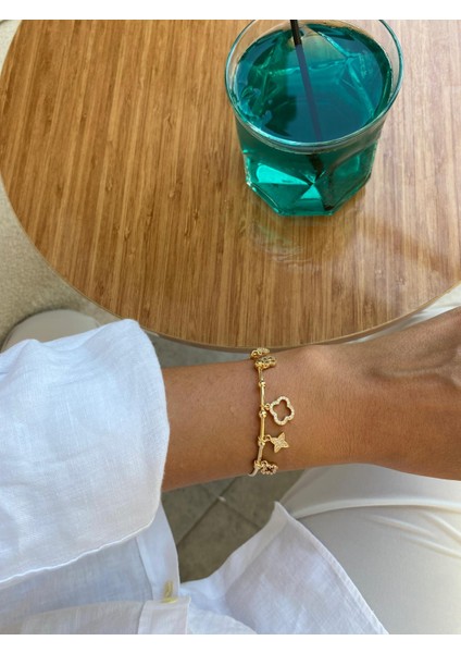 Yonca ve Çiçek Figürlü Zirkon Taşlı Ayarlamalı Açık Gold Bileklik