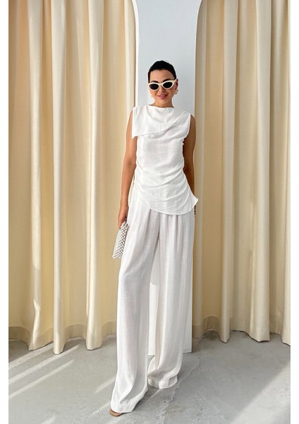 Beyaz Yaka Detaylı Asimetrik Kesim Bluz ve Pantolon Takım