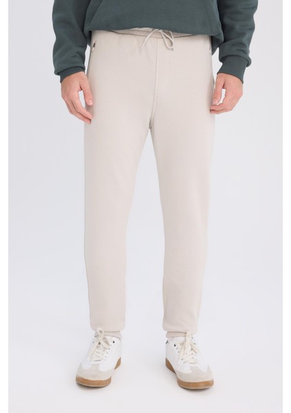 Jogger Eşofman Altı Slim Fit Dar Kesim Beli Bağcıklı Lastikli Paça Fermuar Cepli A4387AX24AU indirimleri