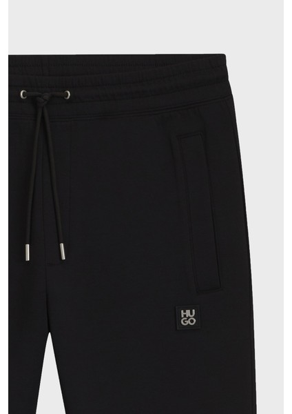 Logolu Streç Pamuklu Relaxed Fit Normal Bel Jogger Pantolon Erkek Pantolon 50533695 002 indirimleri