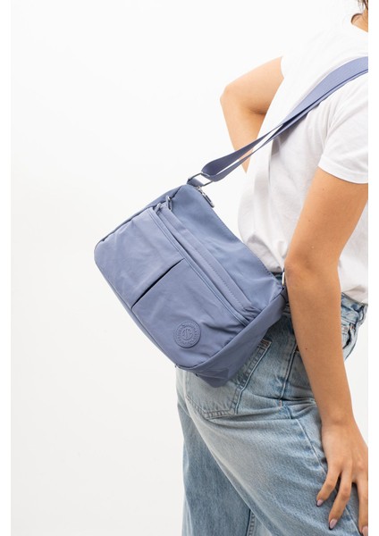Suya Dayanıklı Çok Cepli Unisex Omuz ve Çapraz Çanta, Şık ve Pratik Kullanım Sağlar.