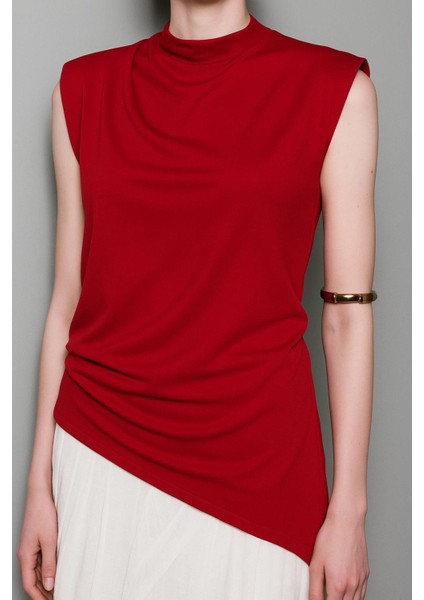 Asimetrik Bel Detaylı Kolsuz Sandy Bluz modelleri