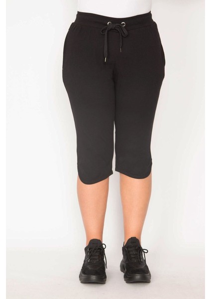 Kadın Siyah Pamuklu Kumaş Kuşgözü Detaylı Bel Lastikli Cepli Kapri 65N29527