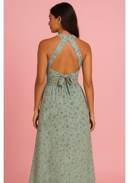 Çiçek Desenli Sırtı Açık Yırtmaçlı Uzun Viskon Elbise fiyatları