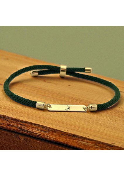 Altın Plakalı 14 Ayar Hz Ali Temalı Yeşil Örgü Ipli Dikdörtgen Motifli Hediye BILEKLIK-554SEMBOL fiyatları