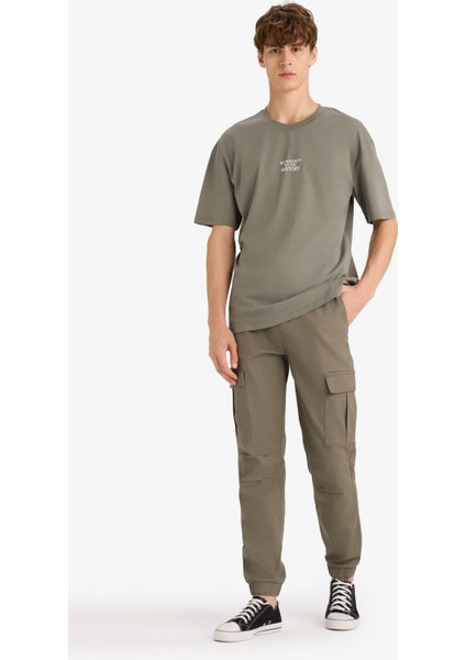 %100 Pamuk Boxy Fit Rahat Kesim Bisiklet Yaka Sırt Baskılı Kısa Kollu Tişört F8331AX25AU fiyatları