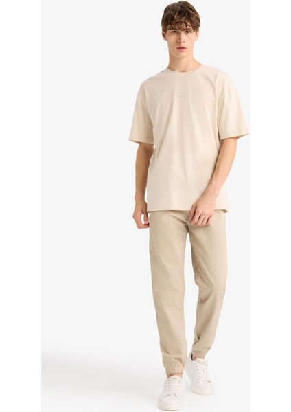 %100 Pamuk Jogger Slim Fit Dar Kesim Beli Bağcıklı Gabardin Pantolon D8607AX25SP fırsatları