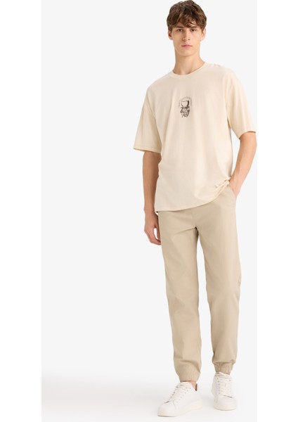 %100 Pamuk Boxy Fit Rahat Kesim Bisiklet Yaka Sırt Baskılı Kısa Kollu Tişört F8322AX25AU fiyatları