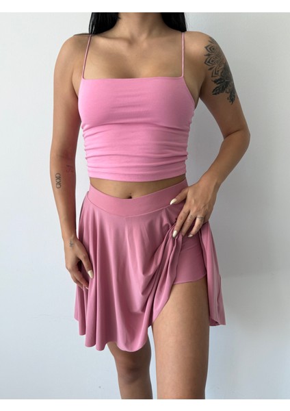 Kadın Pembe Beli Lastikli Volanlı Kloş Içi Şortlu Etek modelleri