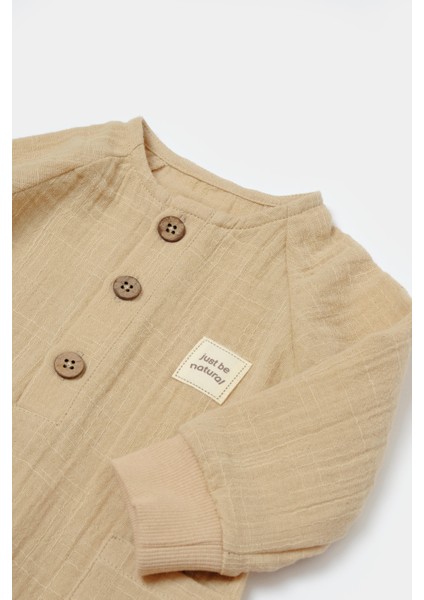 Unisex Bebek Pamuklu Müslin Tulum – Ahşap Düğmeli ve Cepli Tasarım modelleri