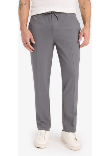 Beli Bağcıklı Lastikli Cepli Jogger Fit Her Yöne Esneyen Yumuşak Tuşe Pantolon A9943AX25AU fırsatları