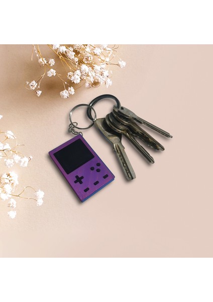 Retro Gameboy Tasarımlı Mor Mini Konsol Anahtarlık – Nostalji Tutkunları Için Özel Aksesuar!