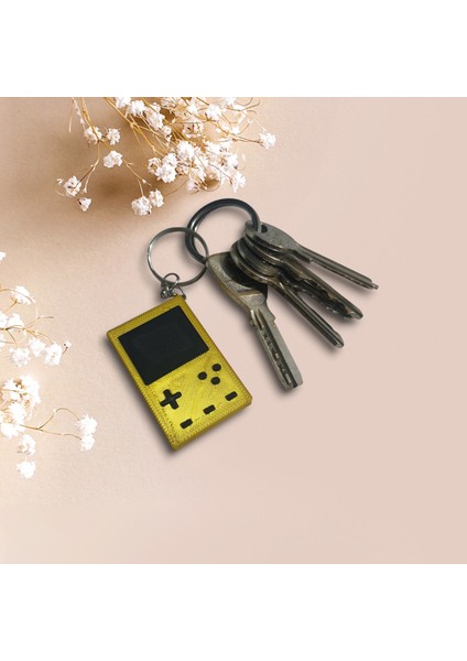 Retro Gameboy Tasarımlı Metalik Sarı Mini Konsol Anahtarlık – Nostalji Tutkunları Için Özel Aksesuar!