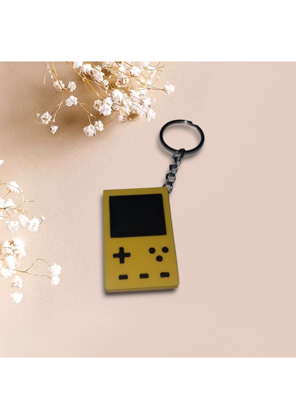 Retro Gameboy Tasarımlı Sarı Mini Konsol Anahtarlık – Nostalji Tutkunları Için Özel Aksesuar! fiyatları