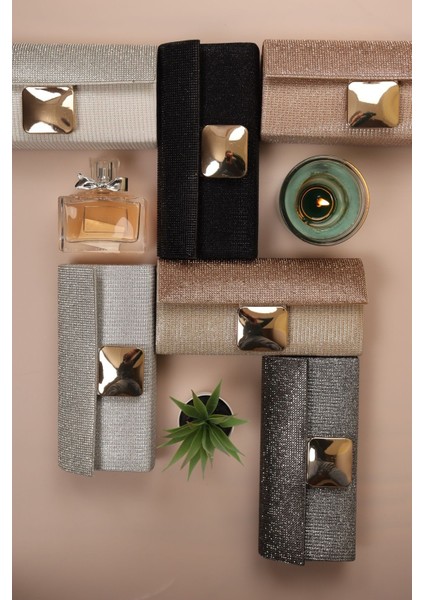 254 Çizgili Nal Şeklinde Taşlı Abiye Çanta fırsatları