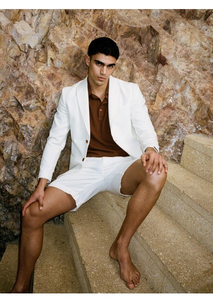 Sisley %100 Pamuk Yırtmaç Detaylı Regular Fit Bermuda Şort Erkek Krem Şort - 325P4GJ0S9018 fırsatları