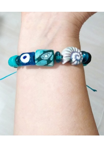 Bodrum Cam Nazar Seramik Salyangoz Ve Turkuaz Rengi Gana Krobo Cam Boncuklu Bileklik