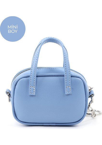 Mavi SHK210 Suni Deri Tek Bölmeli Fermuarlı El Çantası ve Charm Çanta Aksesuarı modelleri