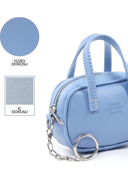 Mavi SHK210 Suni Deri Tek Bölmeli Fermuarlı El Çantası ve Charm Çanta Aksesuarı indirimleri