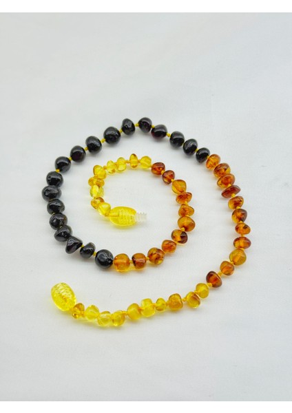 Süzme Bebek Kehribar Kolye fırsatları