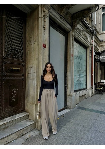 Beli Lastikli Çimalı Pantolon