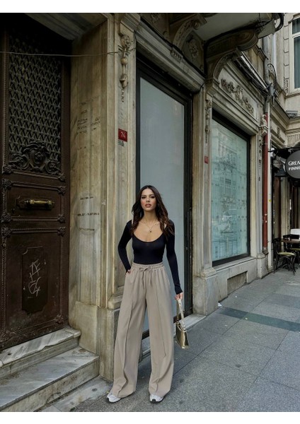 Beli Lastikli Çimalı Pantolon fiyatları