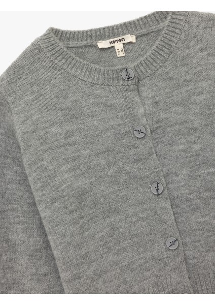 Düğmeli Uzun Kollu Bisiklet Yaka Triko Hırka indirimleri