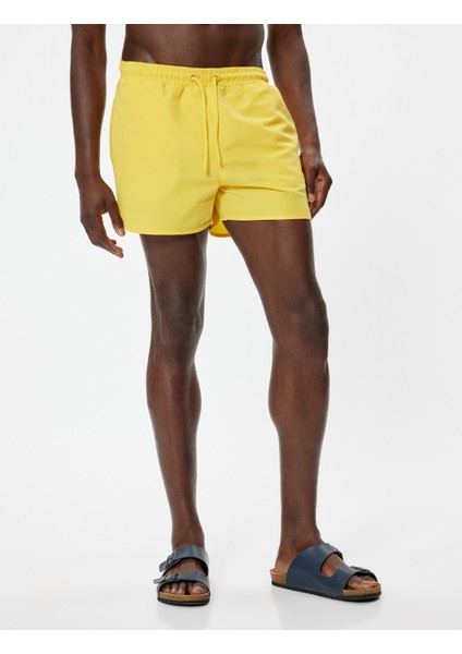 Deniz Şortu Kısa Oversize Beli Bağcıklı Cep Detaylı modelleri