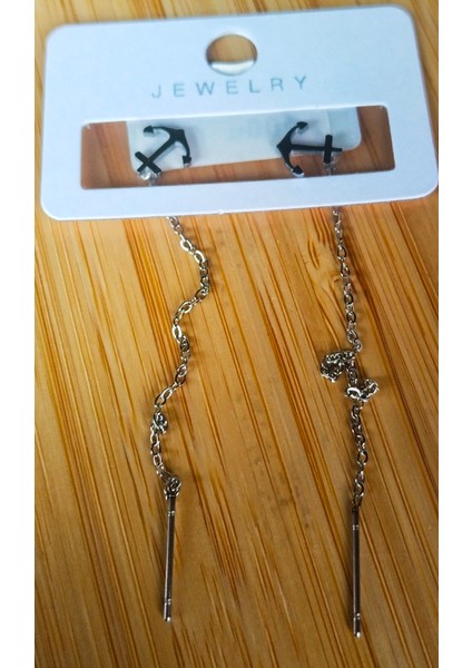 Gümüş Renk Metalik Figürlü Sallantılı Küpe