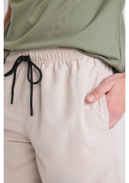 E0993 Bej Regular Fit Kısa Boy Yumuşak Tuşeli Deniz Şortu indirimleri