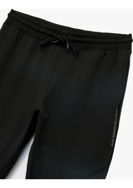 Baskılı Dikiş Detaylı Cepli Beli Bağcıklı Jogger Spor Eşofman Altı modelleri