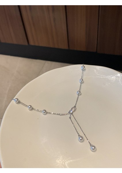 D157 Gümüş Püsküllü Kelebek Inci Kolye (Yurt Dışından) fiyatları