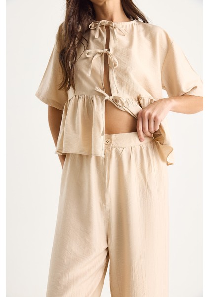 Kadın Bağlama Detaylı Kısa Kollu Bluz Pantolon Alt-Üst Takım indirimleri