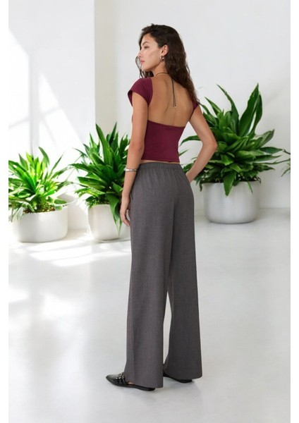 Lastikli Bel Bağcık Detaylı Dökümlü Geniş Paça Pantolon modelleri