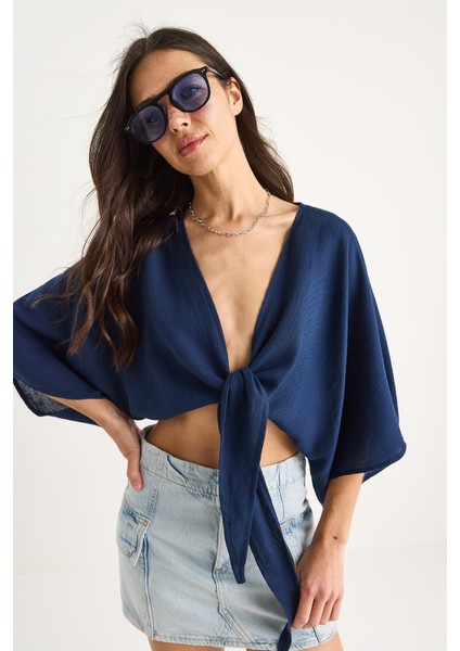 Kadın Geniş Kollu V Yaka Bağlama Detaylı Müslin Bluz fiyatları
